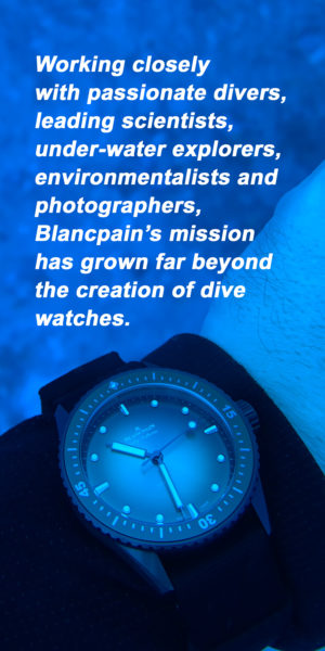 Underwater wristshot of the green-dialed Blancpain Fifty Fathoms Bathyscaphe Mokarran Edition
